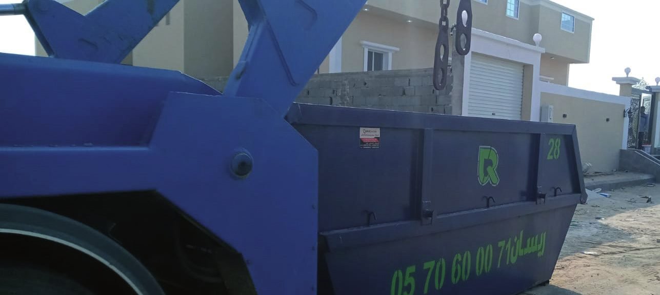 Branded RESAN container at a collection point
